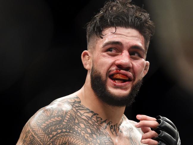 Tyson Pedro of Australia wins his fight against Khalil Rountree of the USA in their Light Heavyweight Bout during the UFC Fight Night at Rod Laver Arena in Melbourne, Sunday, Nov. 27, 2016. (AAP Image/Tracey Nearmy) NO ARCHIVING, EDITORIAL USE ONLY