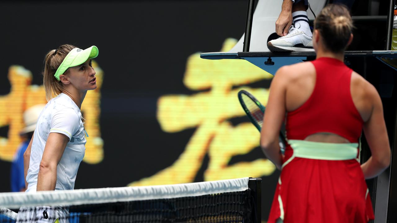 Lesia Tsurenko (left) turns away after refusing to shake Sabalenka’s hand. (Photo by Phil Walter/Getty Images)