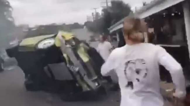 Onlookers were seen sprinting to the crash to try and help passengers involved. Picture: 7NEWS