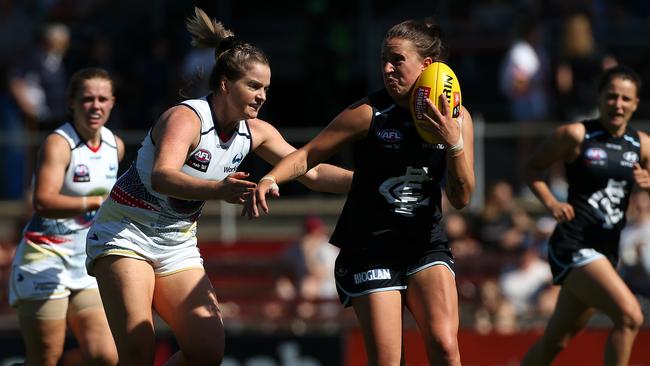 Jayde Van Dyk of the Blues (right) under pressure from Maisie Nankivell of the Crows. Picture: AAP Image/Hamish Blair