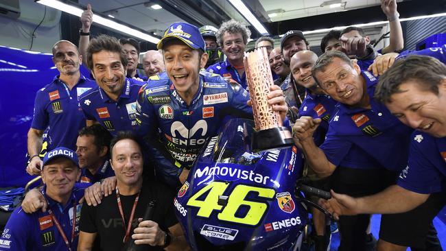 Valentino Rossi celebrating 3rd in the Qatar MotoGP with his crew. Pic: Yamaha