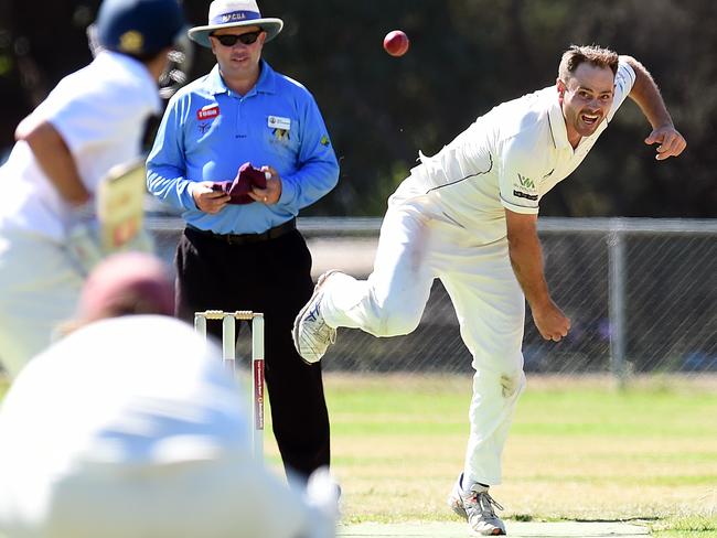 Red Hill's Glenn Collett sends one down.