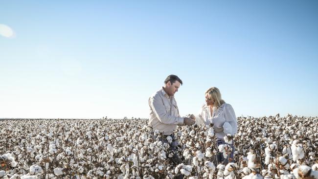 David and Dani Statham of Sundown Pastoral Company in a cotton crop of their Keytah property near Moree in NSW.