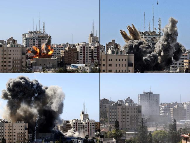 The Jala Tower (tallest building) housing international media outlets in Gaza being hit by an Israeli air strike. Picture: Mahmud Hams/AFP