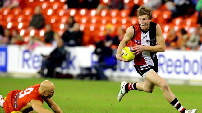 Jack Newnes wrongfoots Gary Ablett in a Gold Coast-St Kilda game in 2012.