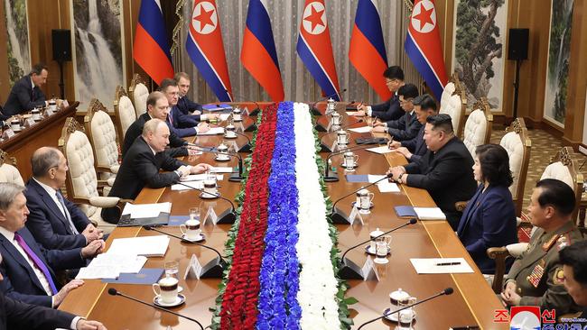 Kim Jong-un (4th R) and Vladimir Putin (4th L) attending a meeting at the Kumsusan State Guesthouse in Pyongyang. Picture: KCNA/AFP.