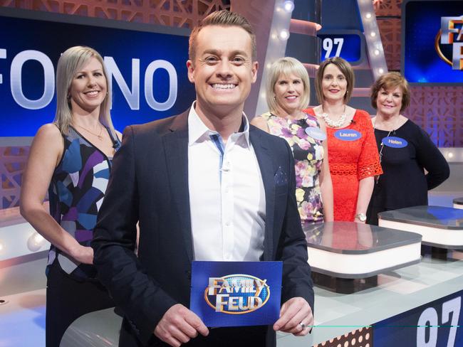 <i>Family Feud</i> host Grant Denyer with contestants.