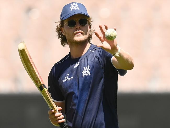 MELBOURNE, AUSTRALIA - FEBRUARY 14: Will Pucovski of Victoria helps his team mates warm up during the Marsh One Day Cup match between Victoria and Queensland at Melbourne Cricket Ground, on February 14, 2023, in Melbourne, Australia. (Photo by Quinn Rooney/Getty Images)