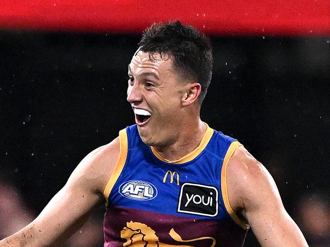 BRISBANE, AUSTRALIA - MAY 29: Hugh McCluggage of the Lions celebrates a goal by team mate Noah Answerth of the Lions during the round 12 AFL match between Brisbane Lions and Essendon Bombers at The Gabba, on May 29, 2025, in Brisbane, Australia. (Photo by Bradley Kanaris/Getty Images)