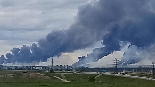 Columns of smoke rise from Russia's Belaya air base located more than 4000km from Ukraine. Drones were used to destroy Russian bomber aircraft. Picture: X