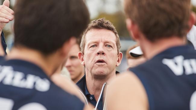 26/7/17 Panther's coach Garry Hocking talking to players at quarter time at the match against Adelaide at Noarlunga Oval. Picture: MATT LOXTON