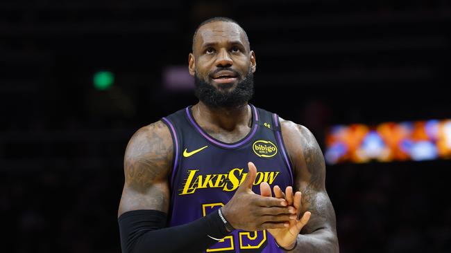 ATLANTA, GEORGIA - DECEMBER 6: LeBron James #23 of the Los Angeles Lakers reacts during the second quarter against the Atlanta Hawks at State Farm Arena on December 6, 2024 in Atlanta, Georgia. NOTE TO USER: User expressly acknowledges and agrees that, by downloading and or using this photograph, User is consenting to the terms and conditions of the Getty Images License Agreement. (Photo by Todd Kirkland/Getty Images)