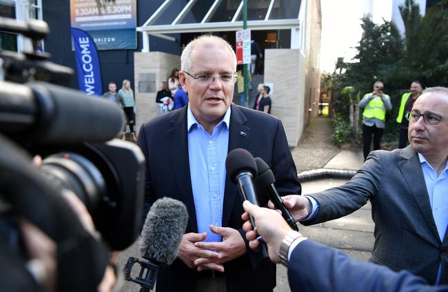 Prime Minister Scott Morrison speaks to the media as they arrive at the Horizon Church in Sutherland in Sydney. Picture: AAP Image/Joel Carrett