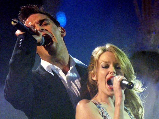 Robbie Williams and Kylie Minogue on stage together. Picture: Getty Images