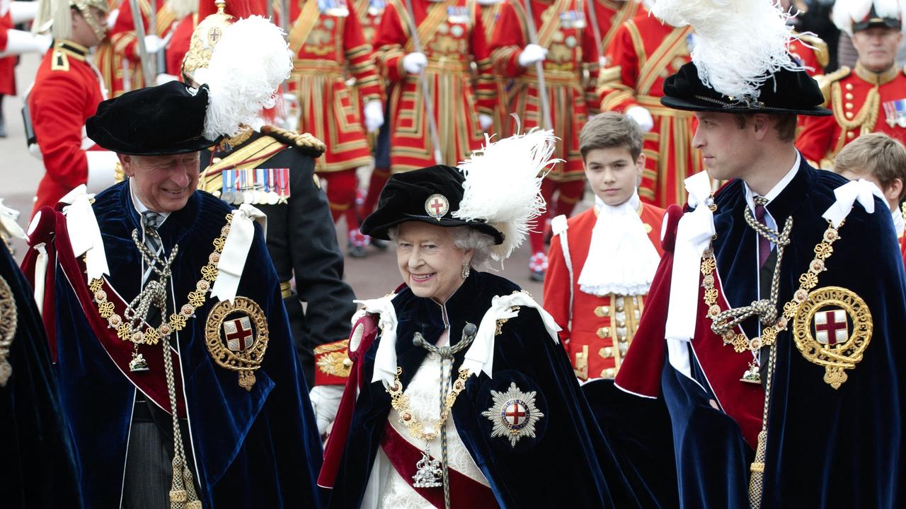 Prince Charles, the Queen and Prince William during the annual parade for members of the Order of the Garter at Windsor Castle on June 17, 2013. Picture: Murray Sanders/AFP