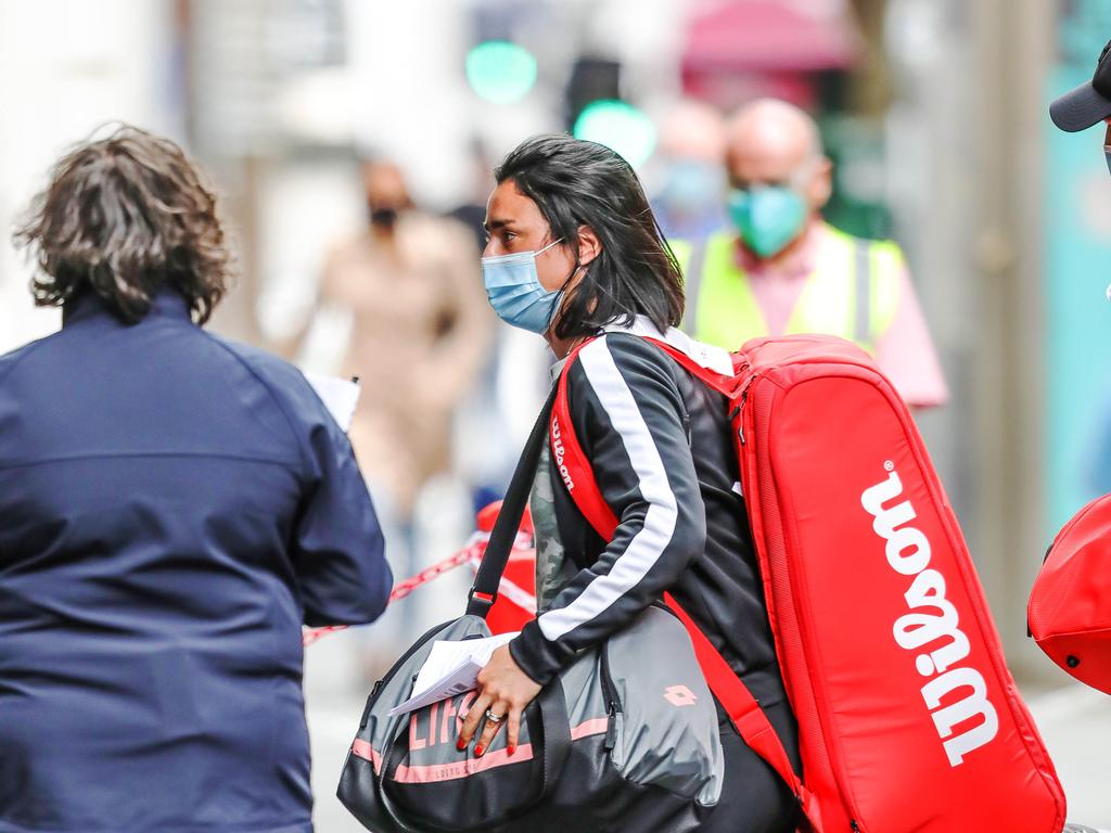 Tennis players arrive in Melbourne.