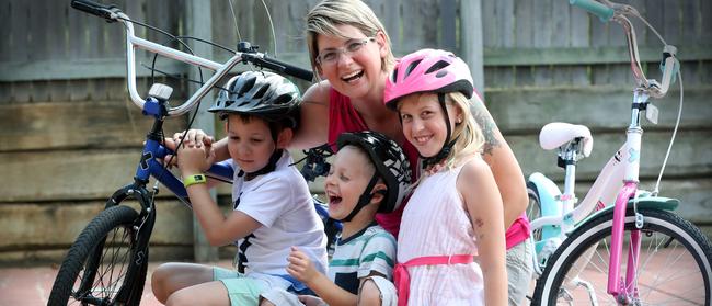 Mother Nikolett Best makes sure her children are active as well as teaching them good screen skills, Zach, 7, Mason, 5, and Ava, 8. Picture: Jamie Hanson