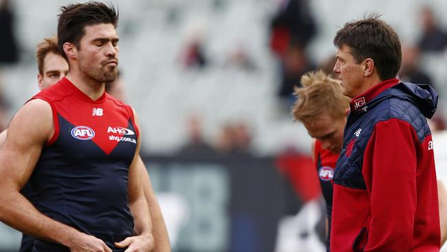 Chris Dawes talks to Melbourne coach Paul Roos. Picture: Wayne Ludbey