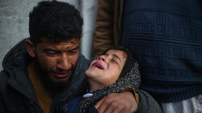 A young girl mourns the death of her sibling. Picture: Getty Images