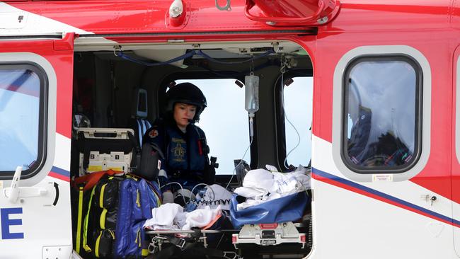 The rescue helicopter arrives at Cairns Hospital carrying the two most critical patients from the Serves You Right Cafe in Ravenshoe PICTURE: ANNA ROGERS