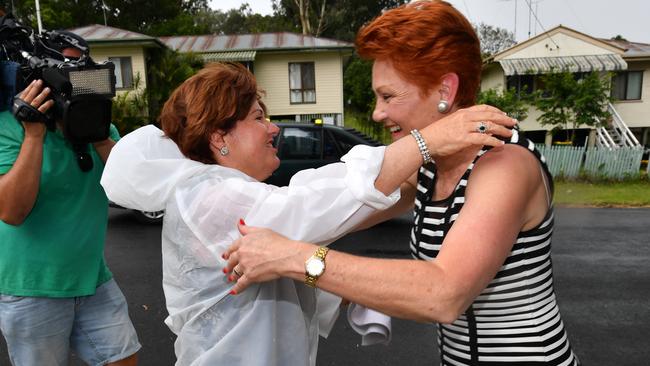 Labor MP Jo-Ann Miller greets Senator Pauline Hanson. Picture: AAP Image / Darren England