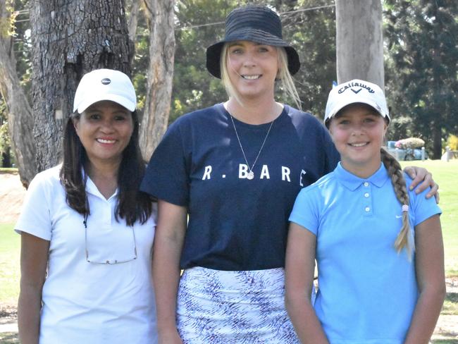 The Sunshine Coast's Marjorie Barden and Chloe Matthews with Jatt Matthews, who is playing in the girls 11-12 years division at the US Kids Golf Foundation Australian Open at the Rockhampton Golf Club on September 27.