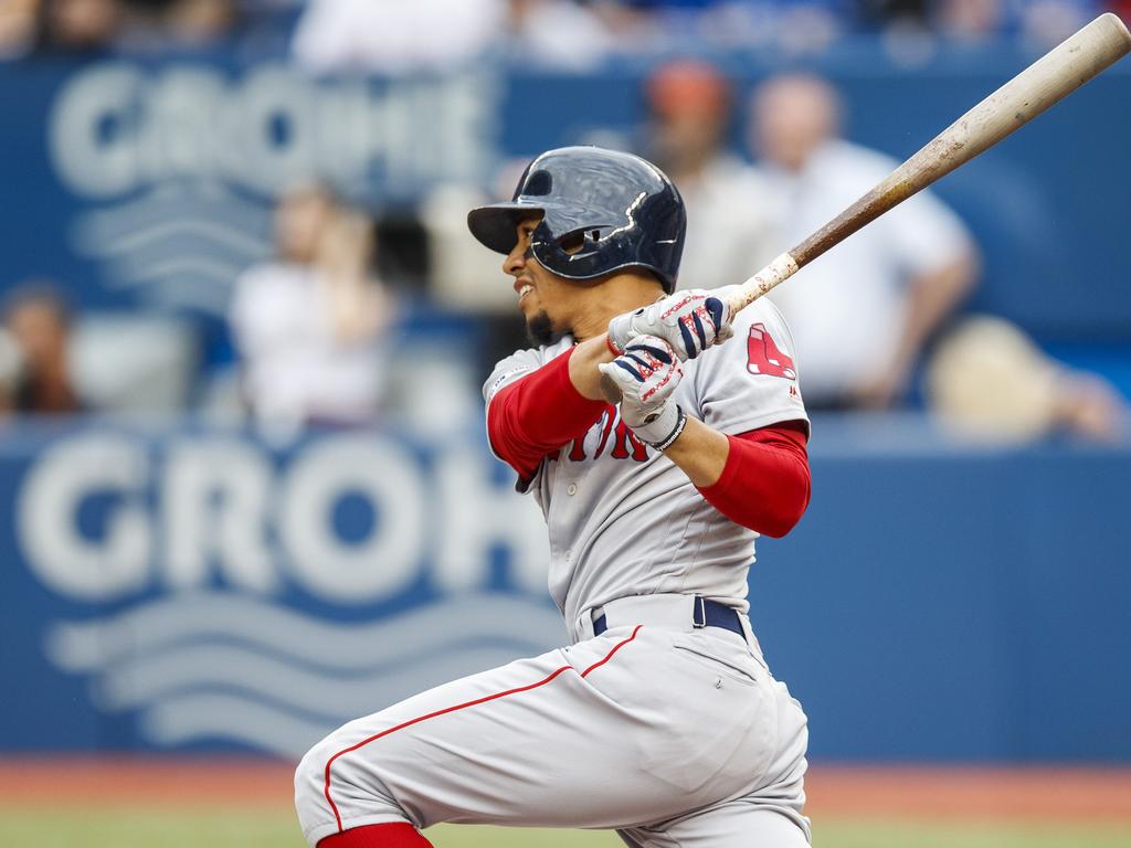 Mookie Betts hits out the Toronto Blue Jays, in Canada this week. Picture: Mark Blinch