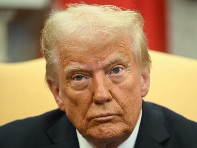 US President Donald Trump looks on during a meeting with Japanese Prime Minister Shigeru Ishiba in the Oval Office of the White House in Washington, DC, on February 7, 2025. (Photo by Jim WATSON / AFP)