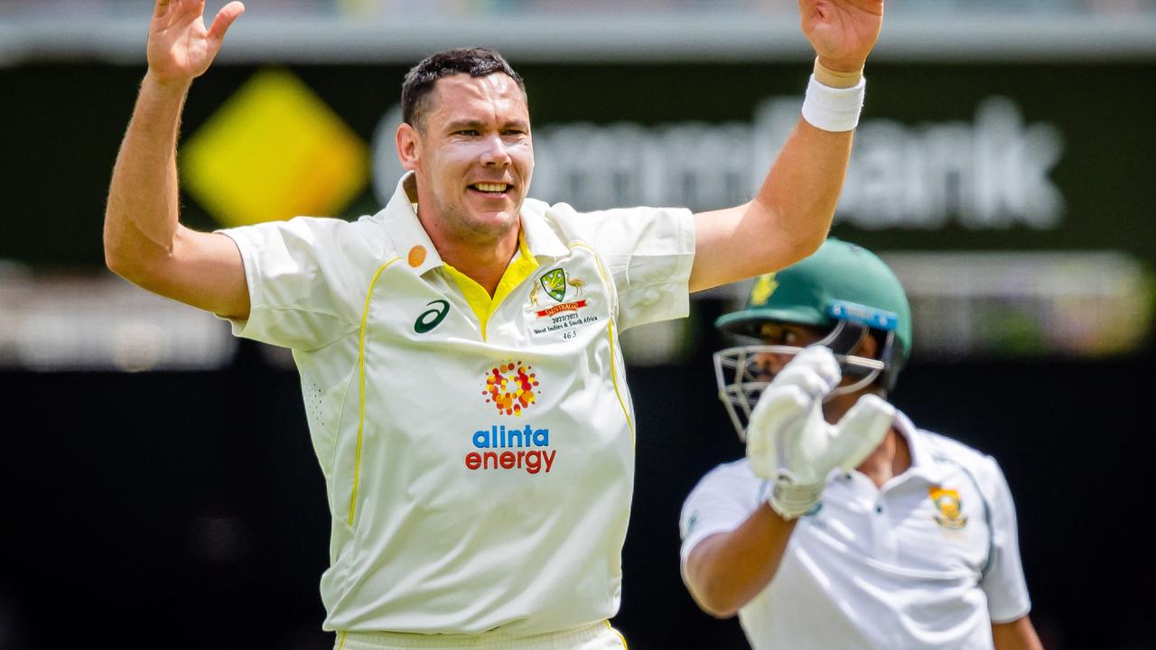 Australia's Scott Boland celebrates after taking the wicket of South Africa's Marco Jansen during day two of the first cricket Test match between Australia and South Africa at the Gabba in Brisbane on December 18, 2022. (Photo by Patrick HAMILTON / AFP) / - IMAGE RESTRICTED TO EDITORIAL USE - STRICTLY NO COMMERCIAL USE-