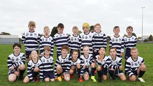 Lara Hynes under-9 football team pull their funniest faces. Picture: Alan Barber