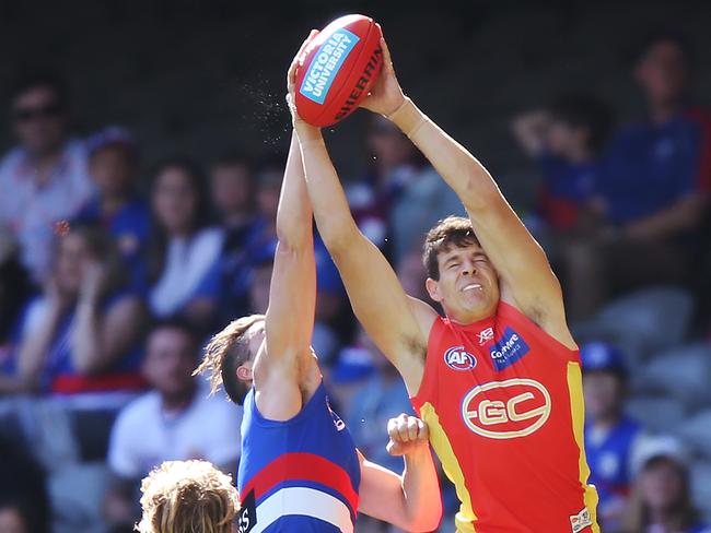 Chris Burgess of the Suns marks during the round three match against the Western Bulldogs. Picture: Michael Dodge/Getty Images