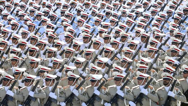 Iranian armed forces march in a military parade marking the 36th anniversary of Iraq's 1980 invasion of Iran, just outside Tehran, Iran. Picture: AP