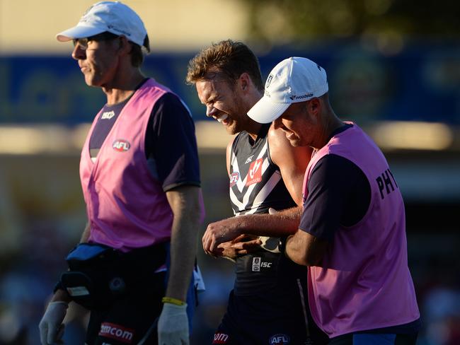 Fremantle’s Paul Duffield was taken off the ground with what appeared to be a serious shoulder injury. Picture: Daniel Wilkins.