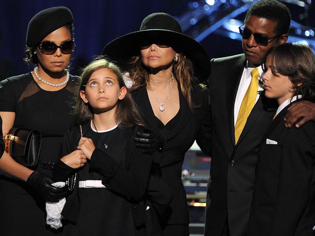 From left, Michael Jackson's sister Janet Jackson, daughter Paris-Michael Katherine, sister Latoya Jackson, brother Jermaine Jackson and oldest son Prince Michael I in 2009. Picture: AFP