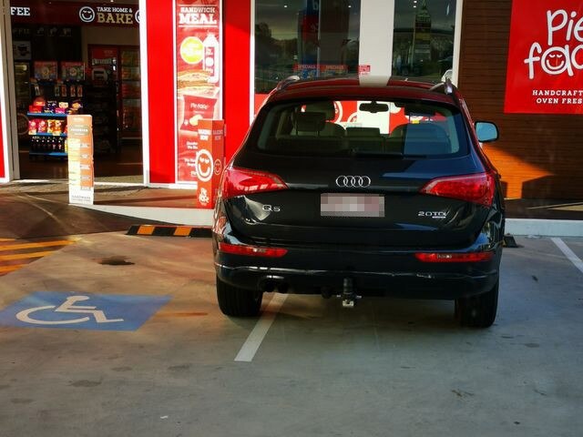 A car without a permit displayed pictured at a United service station in Merrimac. Picture: Facebook/Australian Disability Parking Wall of Shame.