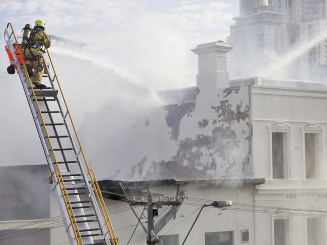 Firefights battling the blaze at the Albion Hotel. Picture: Hamish Blair