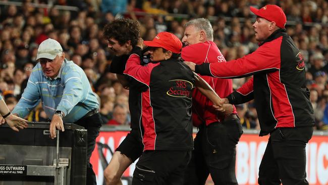 Invading the pitch carries a maximum $5000 fine and a three-year venue ban. Picture: Sarah Reed/AFL Photos