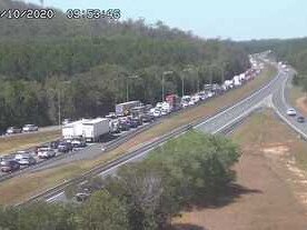 Massive Bruce Highway delays after caravan rollover