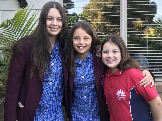 Olivia, Amelia and Holly Seaborne can’t wait to get back to school. Picture: Sarah Matray