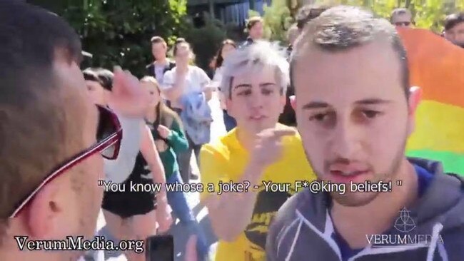 Connor Parissis (yellow, middle) seen in a 2017 video shouting at Christian students.