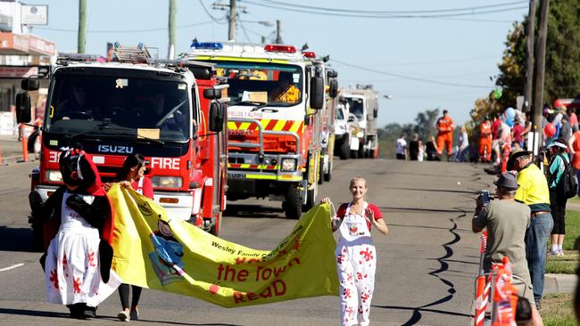 The local emergency services in the parade.