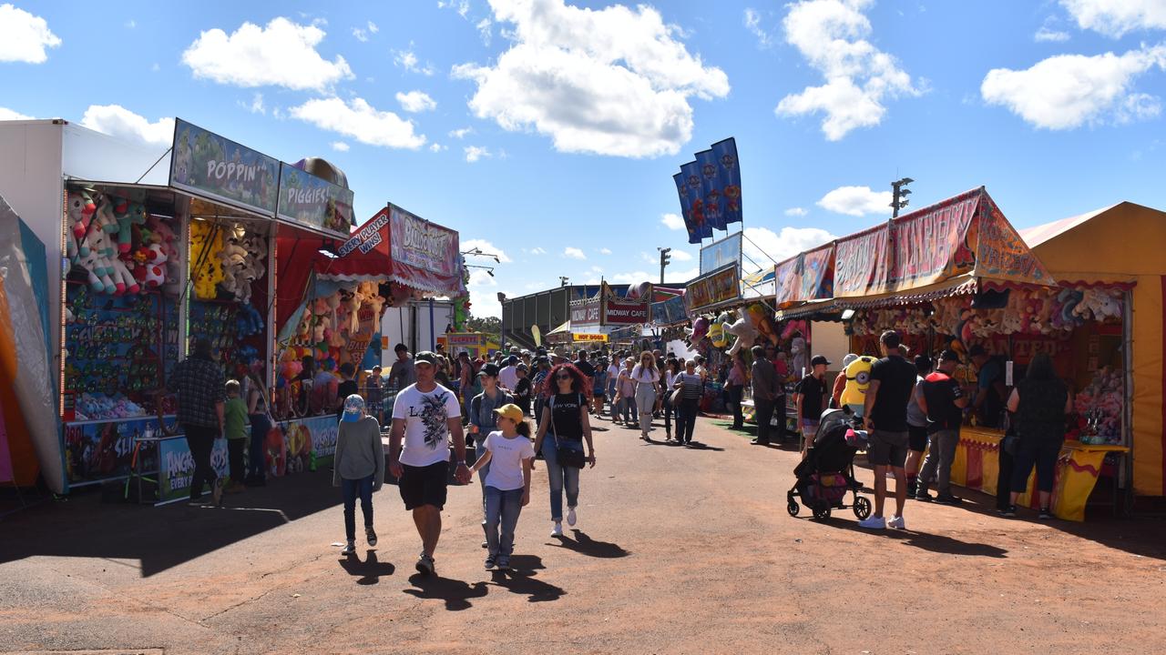 Visitors to the Fraser Coast Ag Show walk through the side show full of games to play. Photo: Stuart Fast