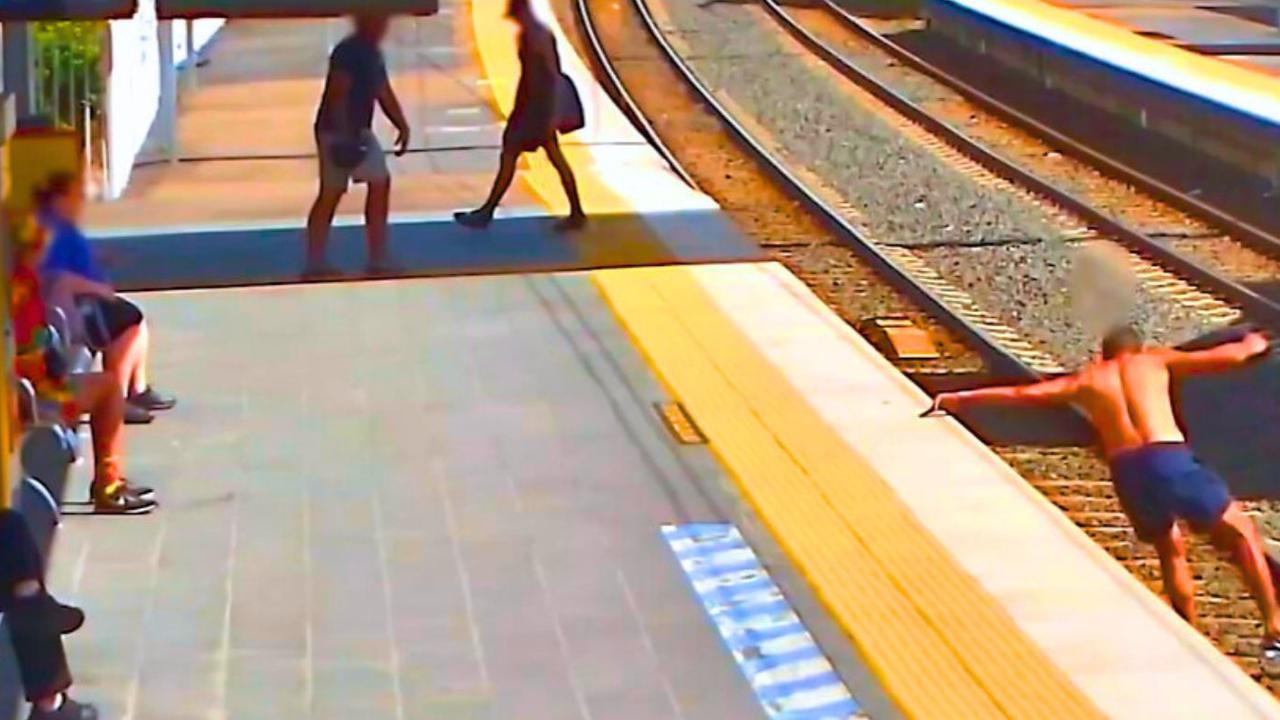 A man slips on the track after jumping off the platform and on to the tracks at Morayfield, raising concerns from the station master. Picture: QR