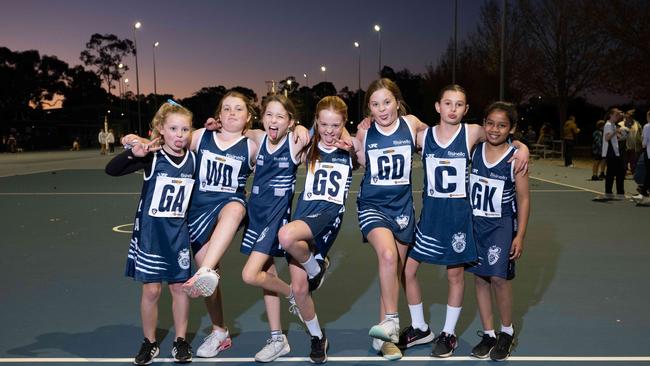 Lara Blue under-11 netball team pull their funniest faces.