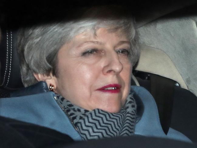 Britain's Prime Minister Theresa May leaves from the Houses of Parliament in Westminster, in central London on March 27, 2019, after hearing the outcome of the indicative votes on the alternative options for Brexit. - Prime Minister Theresa May on Wednesday pledged to step down if MPs back her EU divorce deal, in a bid to break the Brexit deadlock in Britain's fractured parliament. Her dramatic gambit came just two hours before MPs started a flurry of votes seeking a last-minute alternative Brexit plan to replace her deal. (Photo by Daniel LEAL-OLIVAS / AFP)