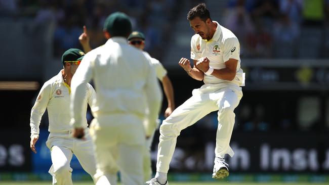 Mitchell Starc celebrates after taking the wicket of Lokesh Rahul. Picture: Getty Images