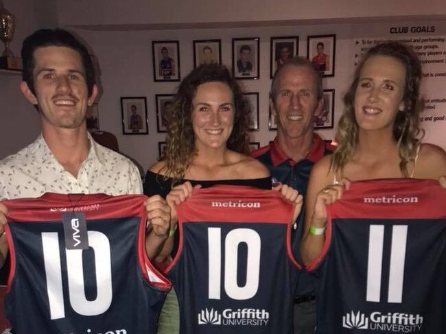 Geelong AFLW player Georgie Rankin (middle) with brother Paddy (left), father John and sister Jessi, each holding their Surfers Paradise guernsey. Picture: Supplied.