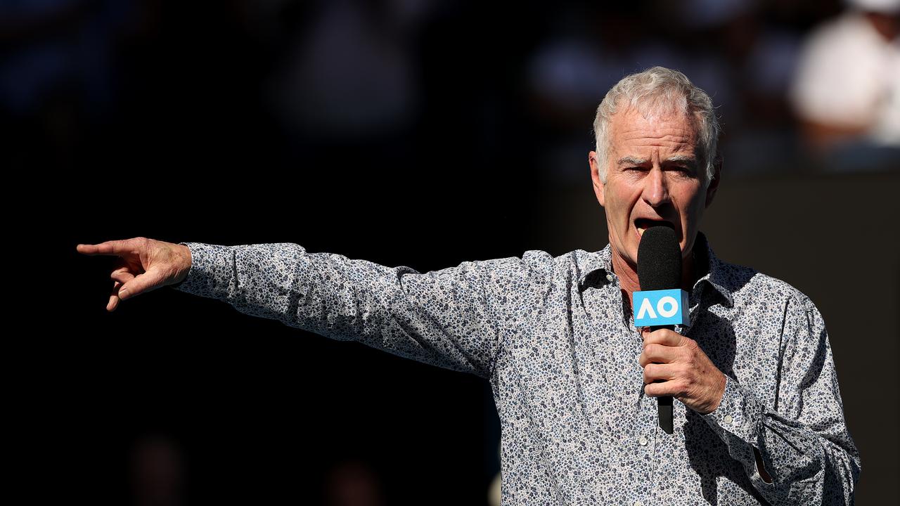 MELBOURNE, AUSTRALIA - JANUARY 25: John McEnroe speaks on court after the Men's Singles third round match between Rafael Nadal of Spain and Pablo Carreno Busta of Spain on day six of the 2020 Australian Open at Melbourne Park on January 25, 2020 in Melbourne, Australia. (Photo by Clive Brunskill/Getty Images)