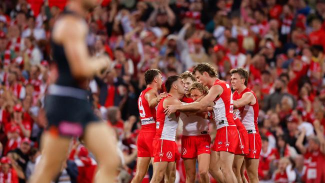 SYDNEY, AUSTRALIA - SEPTEMBER 07: The Sydney Swans celebrate a goal during the 2024 AFL First Qualifying Final match between the Sydney Swans and the GWS GIANTS at The Sydney Cricket Ground on September 07, 2024 in Sydney, Australia. (Photo by Dylan Burns/AFL Photos via Getty Images)