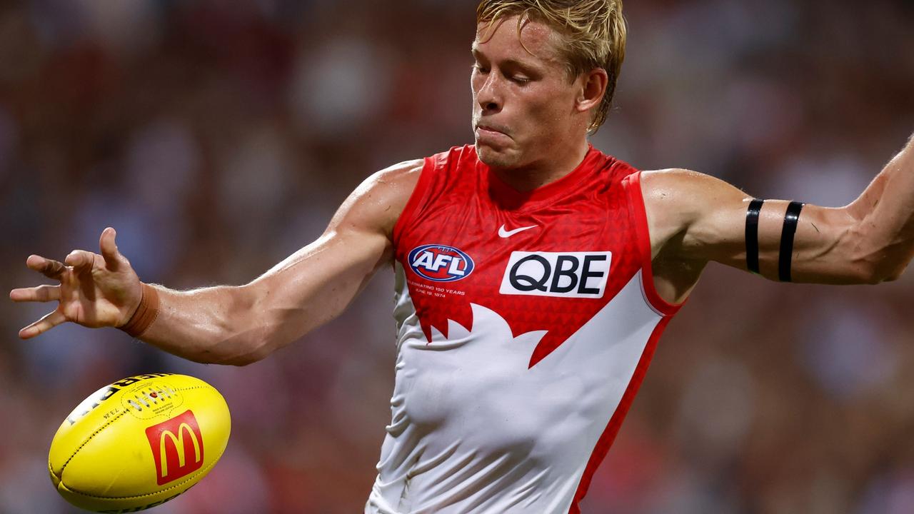 SYDNEY, AUSTRALIA - MARCH 07: Isaac Heeney of the Swans kicks the ball during the 2024 AFL Opening Round match between the Sydney Swans and the Melbourne Demons at the Sydney Cricket Ground on March 07, 2024 in Sydney, Australia. (Photo by Michael Willson/AFL Photos via Getty Images)